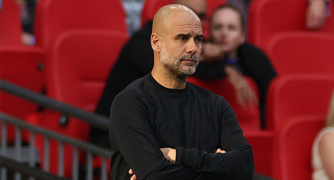 Guardiola Admits Manchester City Must Earn Champions League Spot